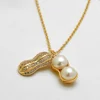 /product-detail/factory-direct-peanut-necklace-personality-diamond-neck-pendant-62149521899.html