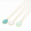 Drop-shaped turquoise set with long delicate chain necklace