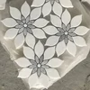Carrara white petals wrap the gray flower and white cores marble mosaic for wall design