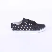 China fashion flat wholesale PU upper ladies rivet casual women shoes