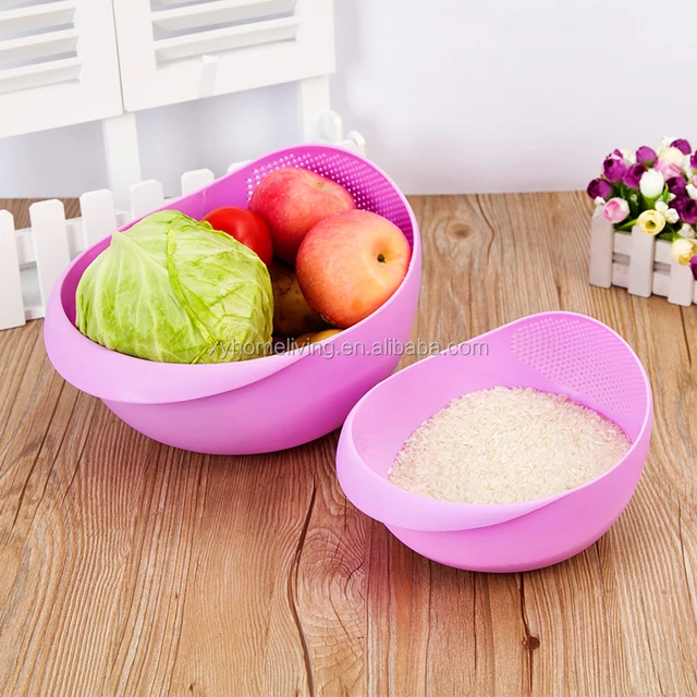 plastic kitchen gadgets in fresh fruit and vegetable box