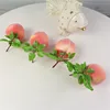 /product-detail/high-quality-artificial-fruit-decoration-pink-peach-string-for-gift-60788772578.html