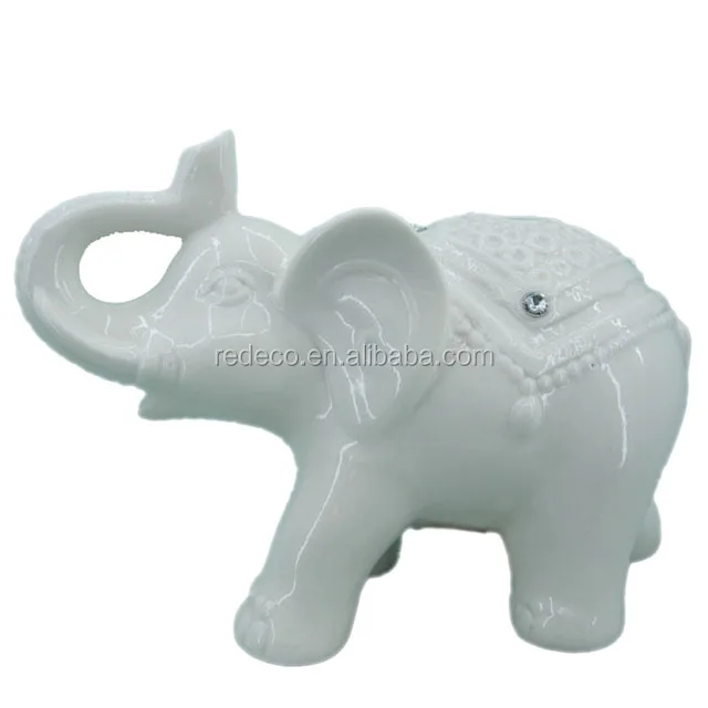 white ceramic elephant photo