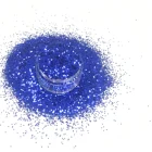 Colorful blue glitter powder for cards