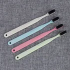 adult toothbrush with charcoal bristle and biodegradable handle and environmental friendly