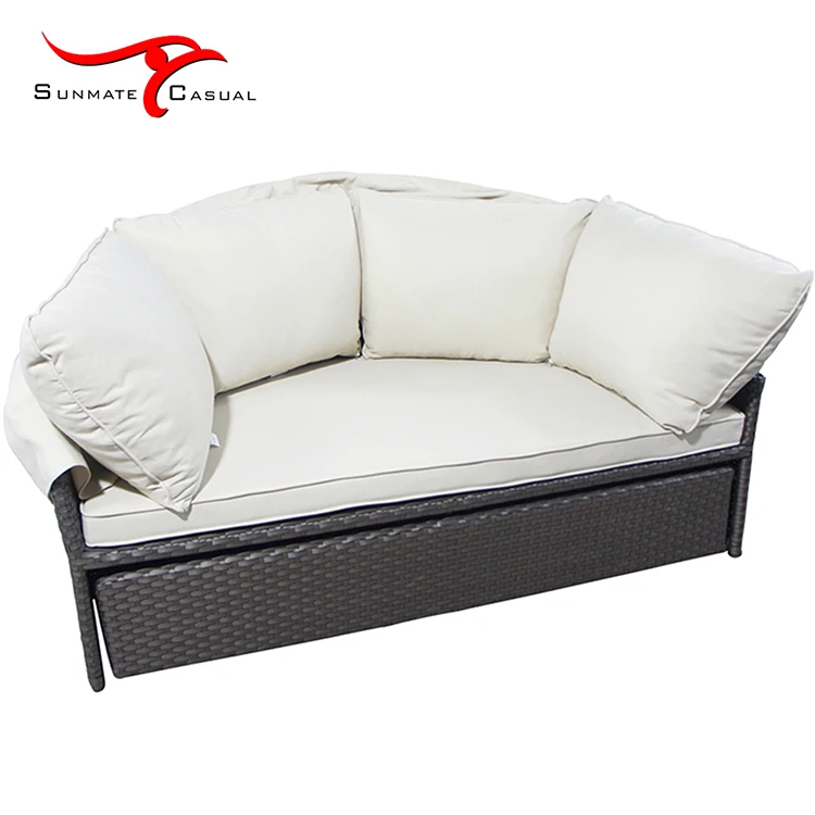 rattan daybed with pillow.jpg