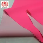 Neon Pink Color Pu leather 0.5mm Thickness With Recycle Polyester Backing Fabric For Ladies Garment and Raincoat