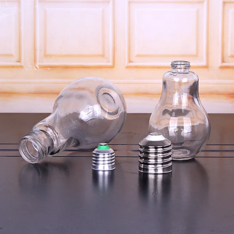 factory sale 50ml 100ml 150ml glass light bulb bottle with lid and straw for fresh juice drinking