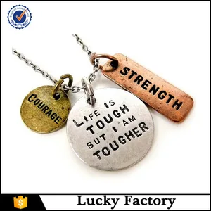 life is tough but i am tougher three tone antique stamped charm