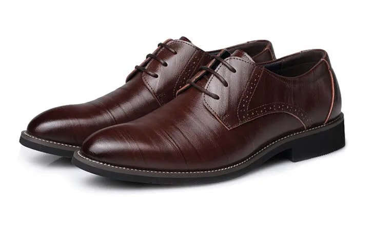 The new men's fashion 2015 new leather hollow pointed shoes casual fashion business shoes pointed flat shoes Oxford man