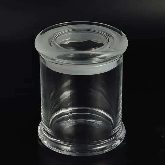 Glass candle jar with lids.jpg