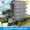 commercial scale model with green garden