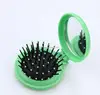 Promotional plastic foldable travel pocket smallcomb hair brush with ladies makeup mirror