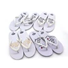 /product-detail/wholesale-slipper-for-wedding-cheap-beach-white-wedding-guest-favors-flip-flop-woman-60575652837.html