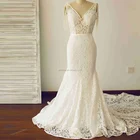 Mermaid Sheer Ivory Lace Deep V Neck Wedding Dress with Bow on Shoulders