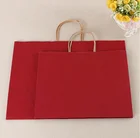 Kraft paper bag/ custom clothing store shopping bag / gift bag red paper bag wholesale printing