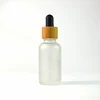 wooden bamboo cap frosted amber blue clear and green glass dropper bottle 30 ml for essential oil