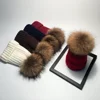 /product-detail/winter-women-raccoon-fur-pompom-knitted-hat-beanies-fur-pom-pom-hats-60548763200.html