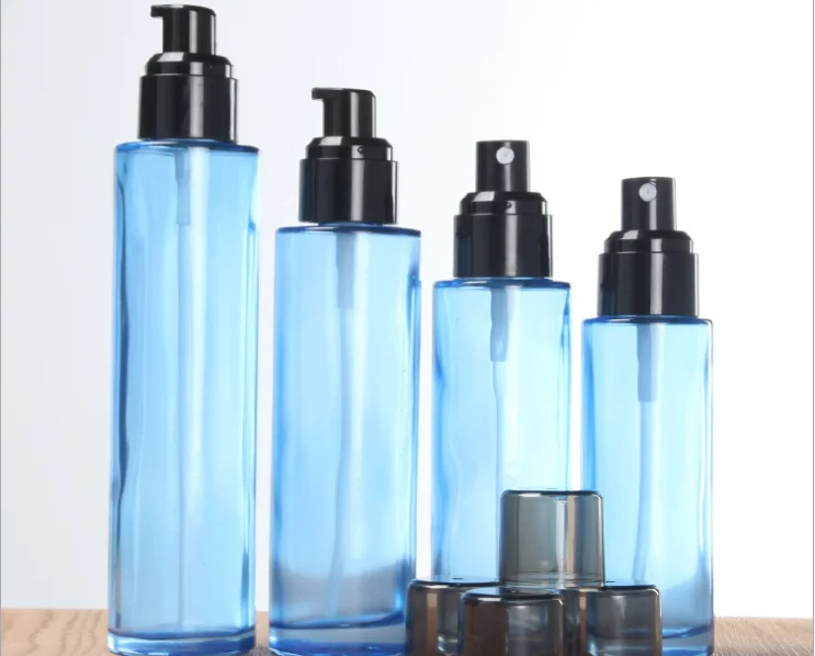 Wholesale 30ml 50ml 100ml transparent blue color Cosmetic packing bottle set bottle cream container for luxury skin care
