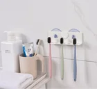 QIYUE Wall Mounted Plastic Special Design Suction Bathroom Toothbrush Holder