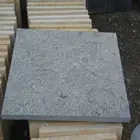 bush hammered paving stone tiles in blue limestone