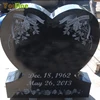 Carved granite heart shaped cemetery headstone