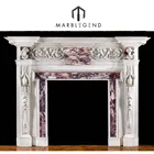 An antique fireplace surround in the manner of William Kent traditional marble fireplace