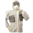 Disposable construction SMS coverall with chest window