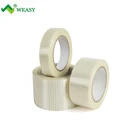 Filament strapping adhesive tape