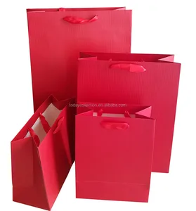 plain paper gift bag with tree line embossing