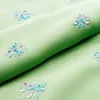 hot sales garment fabric embroidered flowers chiffon textile embroidered tulle fabric