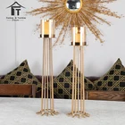 Floor standing tall metal cracked candle holder with glass