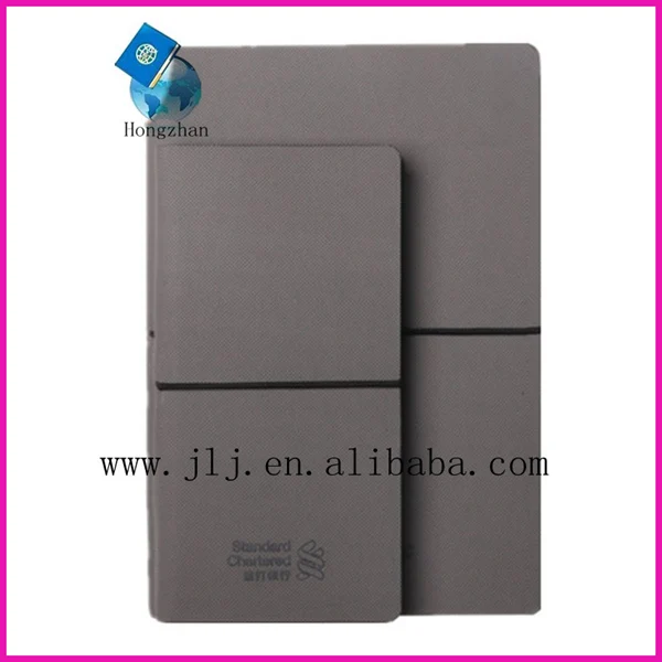 Pocket notebook with pen holder