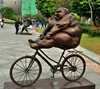 /product-detail/life-size-fat-woman-on-a-bicycle-bronze-statue-60742718064.html
