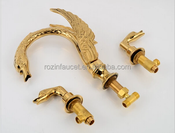 Cuarto de baño de lujo oro latón Cisne grifo del fregadero doble maneja