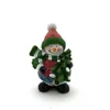 Mini holiday resin snowmen holding snowing christmas tree