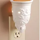 Burner Hot Sale Carved Shaped Hollow Out Plug In Ceramic Fragrance Oil Burner With Wax Melt Aroma Burner Warmer