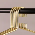customize luxury rose gold metal clothes hanger shop display