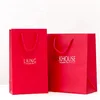 Personalized logo custom printing red paper shopping bag brand name