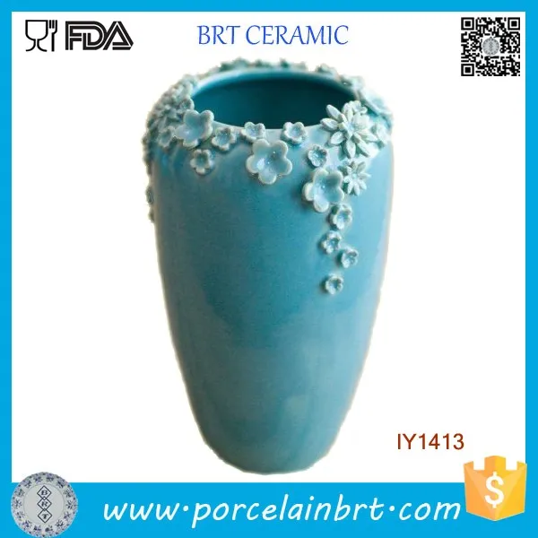 sightly decorated with little blue flowers ceramic decoration