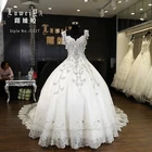 Buy china guangzhou luxury Dubai Muslim Wedding Dresses shoulder ball gown with Long Train beaded wedding dress for bride