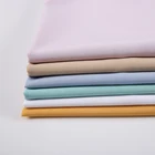 Lowest price simple style plain dyed soft polyester reinforced 4 way stretch spandex fabric