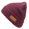 factory custom logo winter knitting hat,leather label fisherman beanie