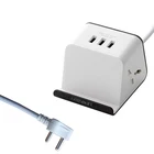 2 pin power extention socket board on table with phone holder
