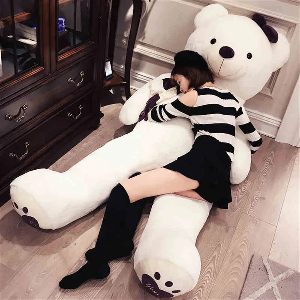 giant teddy bear with girl