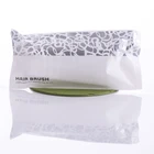 Disposable, individually printed plastic combs for hotels