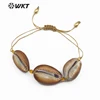 WT-B444 New Arrivals Jewelry Three Natural Cowries with Golden Separating Beads in the Middle Adjustable Brown Shell Bracelets