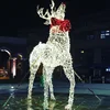 Outdoor lighted large Christmas reindeer decoration city street Christmas display Rudolph the red-nosed reindeer