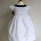 Hot sales sleeveless cotton linen navy bow smocked girl's dress
