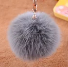 Cute Genuine new style new york hats/fur tail pendant/fox fur hat pom poms